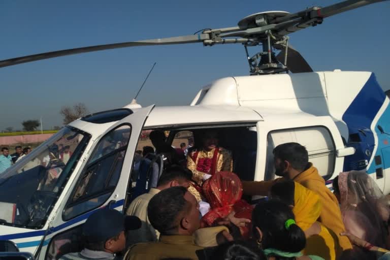 groom arrives from helicopter