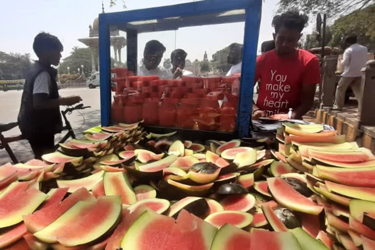 A watermelon merchant raising awareness of cleanliness