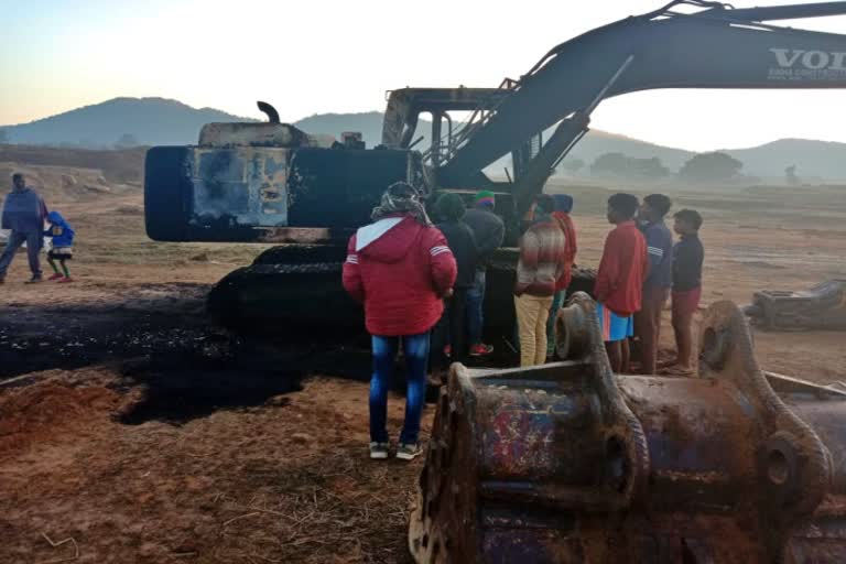 Naxalites set fire to a JCB in Lohardaga