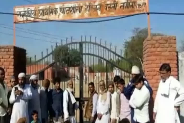 villagers of nuh lock nagina primary school after transfer of a teacher