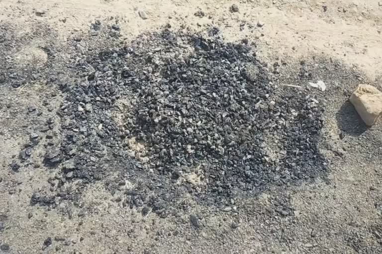 burn oil in road construction