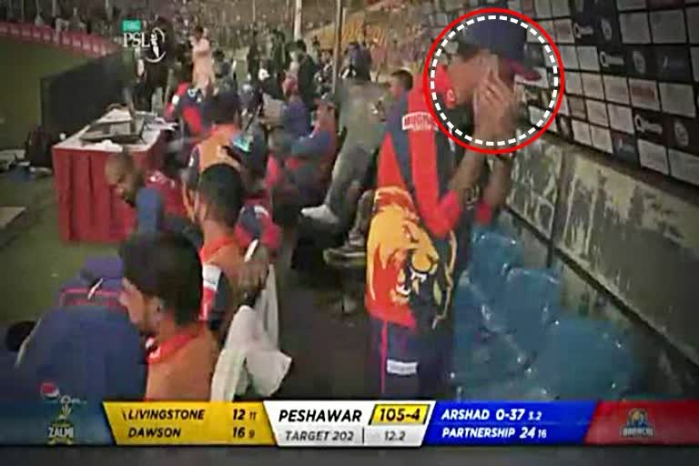 Players are using mobile phone in the Dugout during a PSL game