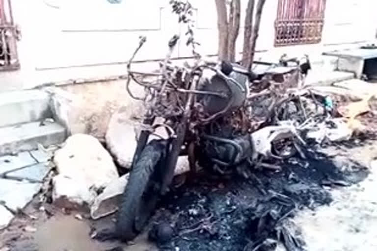 husband burnt a bike in Vijayawada due to anger on his wife