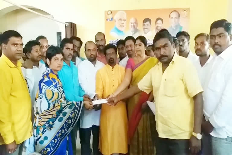 bhainsa bjp financial Assistance for Non-Violent Families at nirmal district