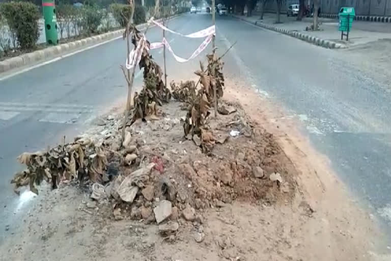 Debris lies in the middle of the road in Dwarka