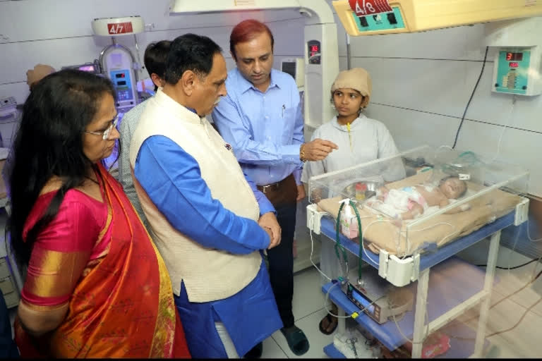 CM Rupani visits hospital, checks abandoned newborn