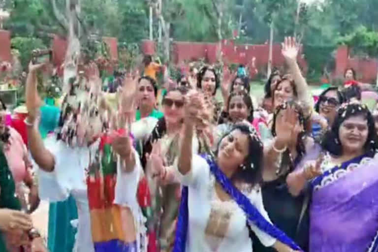 women played Holi with herbal colors and flowers In Faridabad