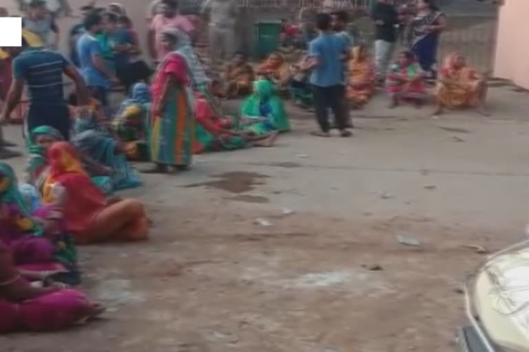 villager protest in front police station