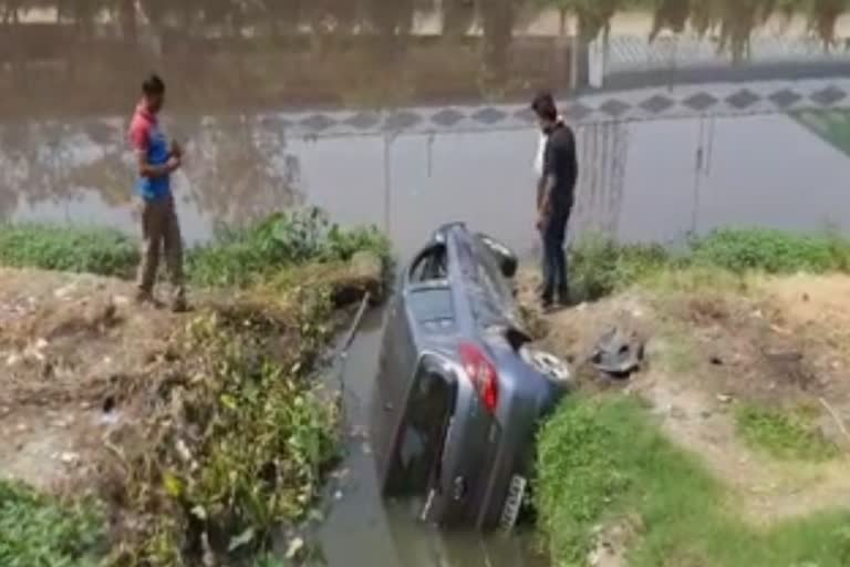 The driver of the car fell into the canel