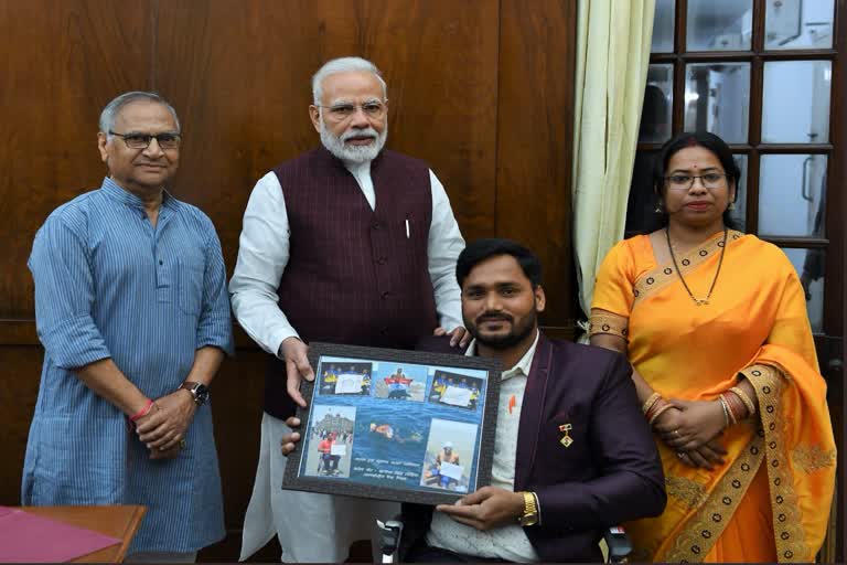 handicapped Para swimmer Satendra Singh meets PM Narendra Modi