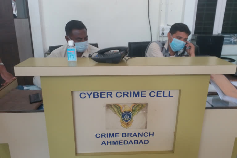 Ahmedabad: Cyber crime personnel on duty with masks and using sanitizers during Corona effect