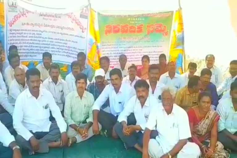 mnregs field assistants protest in kusumanchi since five days