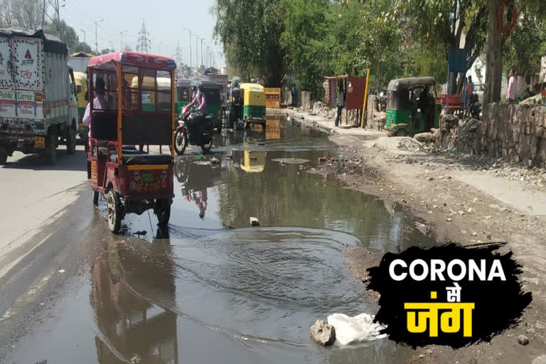 Drain water on main road