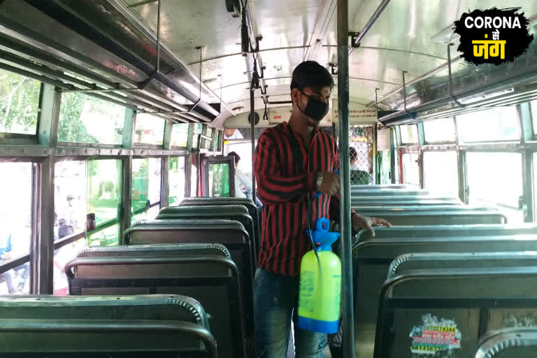 Sanitation of buses being done at the old bus stand of Ghaziabad