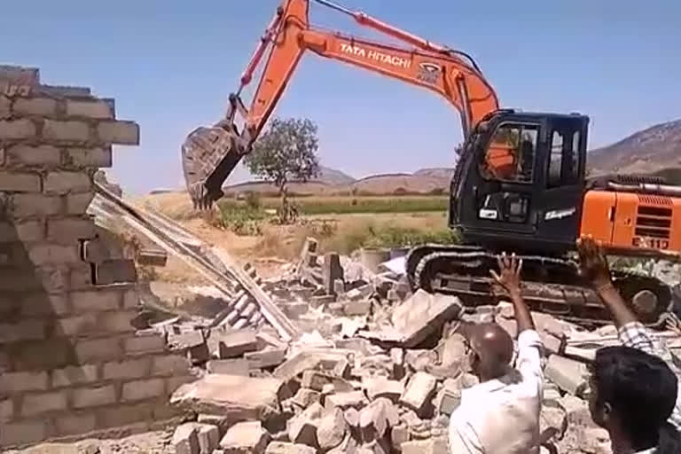 illegal houses demolition in puttaparthi