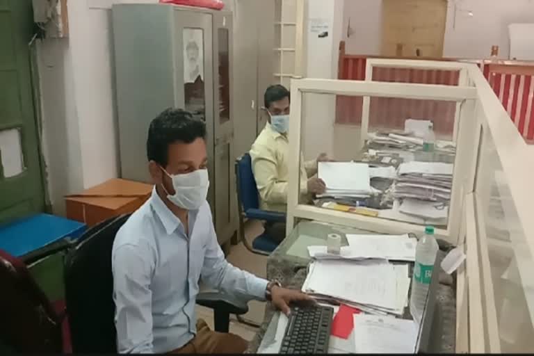 Employees working by putting on masks in government departments in agar malwa