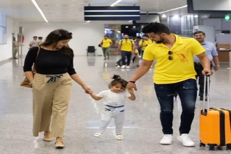 Suresh Raina with a baby boy