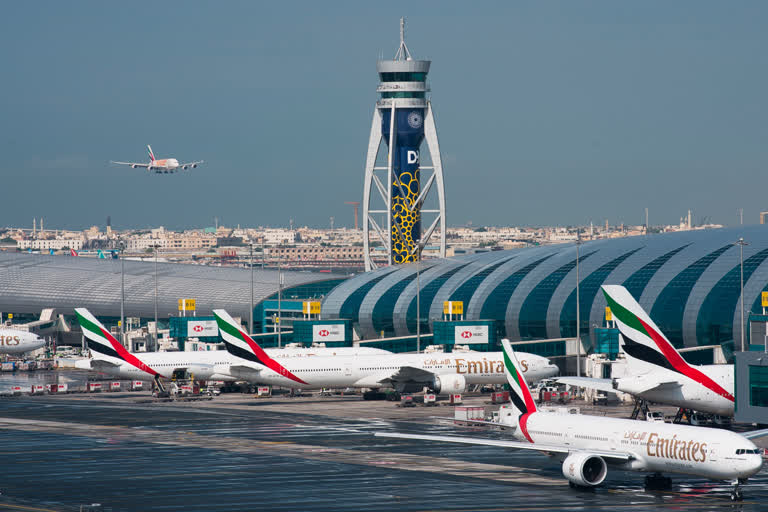 UAE to suspend flights amid coronavirus  Saudi Arabia imposes curfew amid COVID-19  COVID-19 in United Arab Emirates  UAE emergency amid COVID-19  சவூதி அரேபியாவில் ஊரடங்கு உத்தரவு அமல்!  துபாய் விமான சர்வதேச விமான நிலையம், கரோனா பாதிப்பு, சவூதி அரேபியா