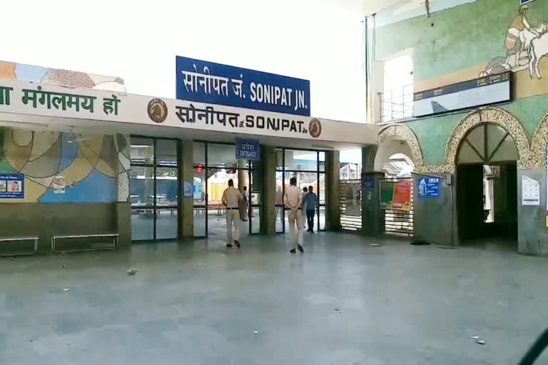 Passengers arriving at sonipat railway station for train