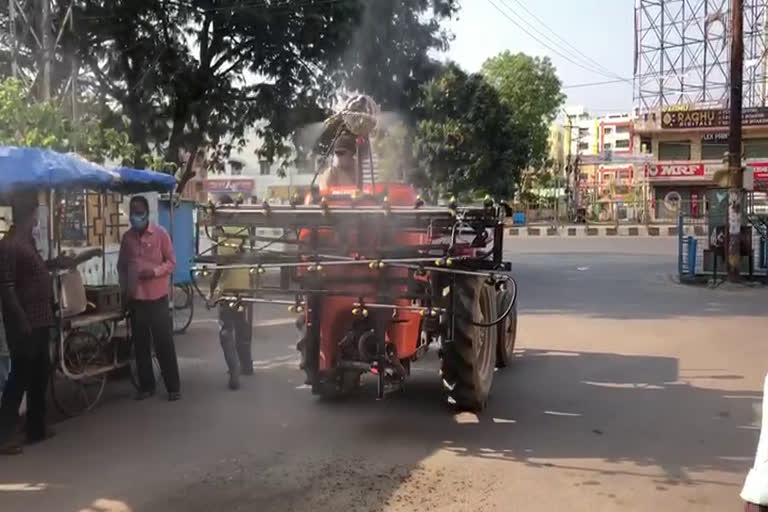 ghmc disaster unit spraying chemical in corona affected places in city