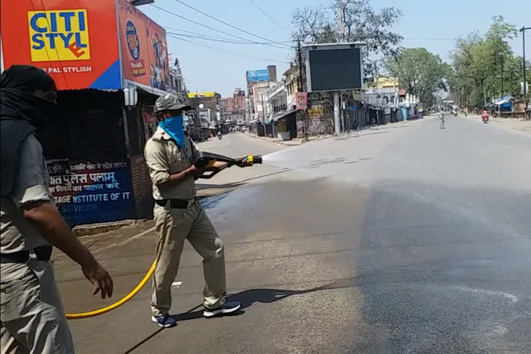 Spraying of sodium hydrochloride in Medininagar to prevent corona virus