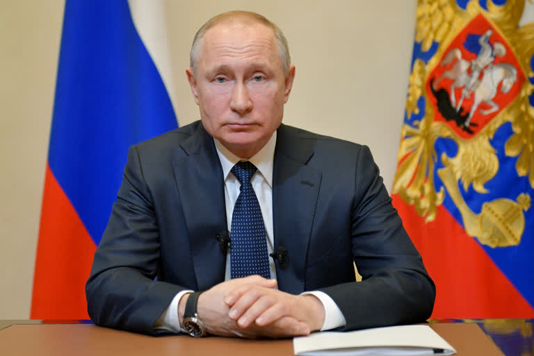 Putin delays constitutional vote allowing him to keep power