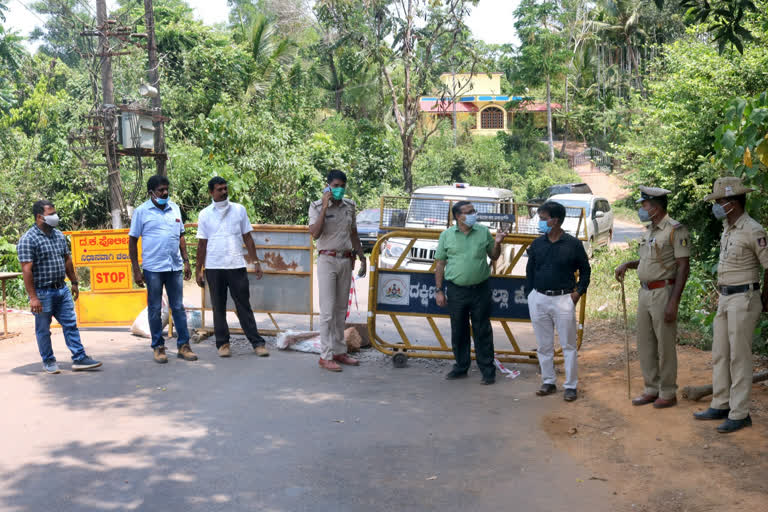 Officers poured mud into the road to prevent vehicles coming from Kerala