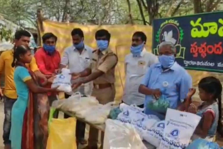 Distribution of essential commodities under the auspices of the charity