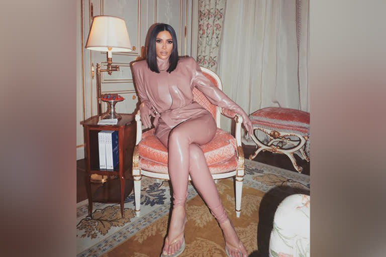 Kim Kardashian shares throwback picture in latex suit