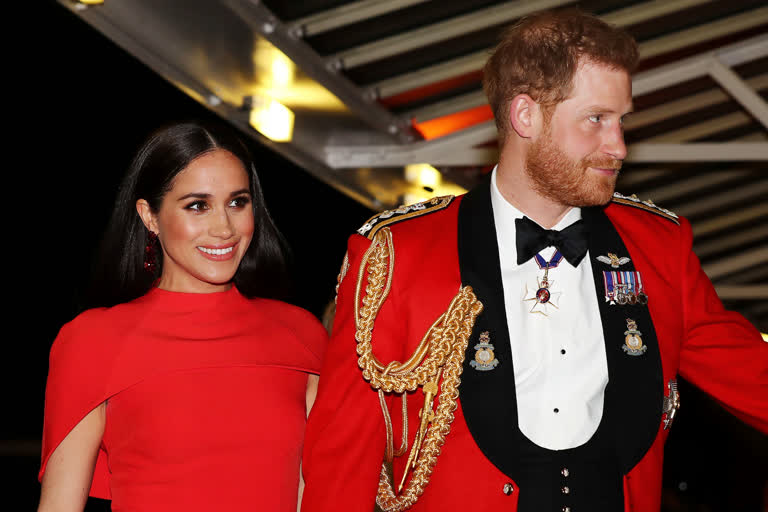 UK's former prince Harry and his wife Meghan Markle