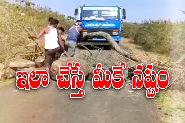 villagers-stacked-trees-and-stones-across-the-road-in-vishaka-paderu