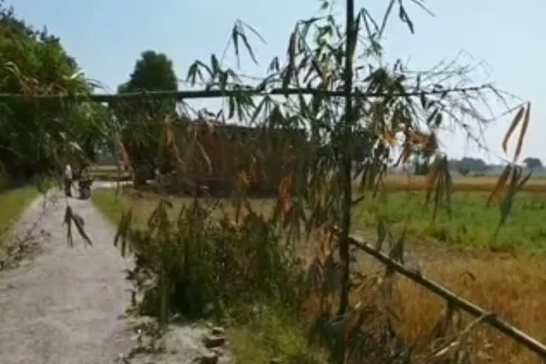 people set up a barricade on the way to avoid the coronavirus in mau uttar pradesh