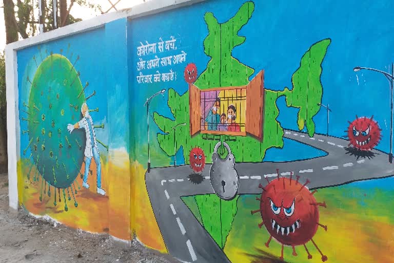 Jamshedpur notified area committee making people aware of corona through painting