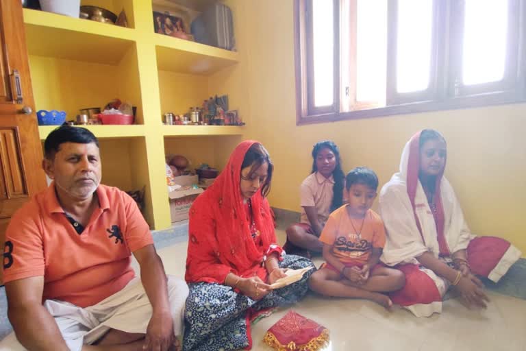 People celebrating Navratri festival at home