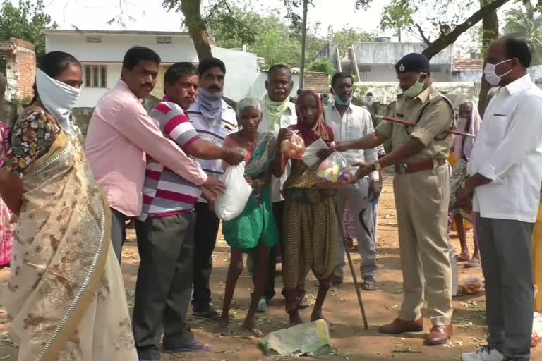 Distribution of essential commodities of employees at warangal rural