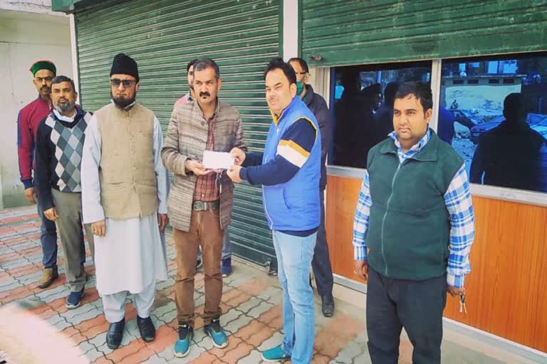 Raghunath temple committee donates money