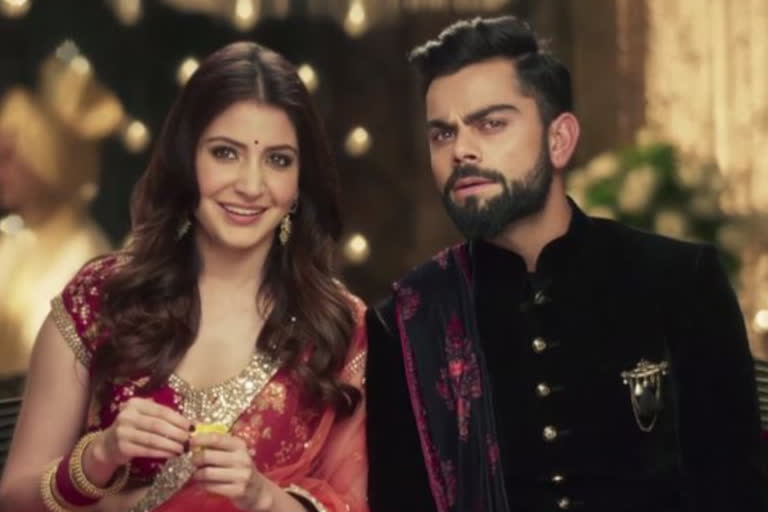 virat kohli posts pictures with anushka sharma says our smiles maybe fake but we are not