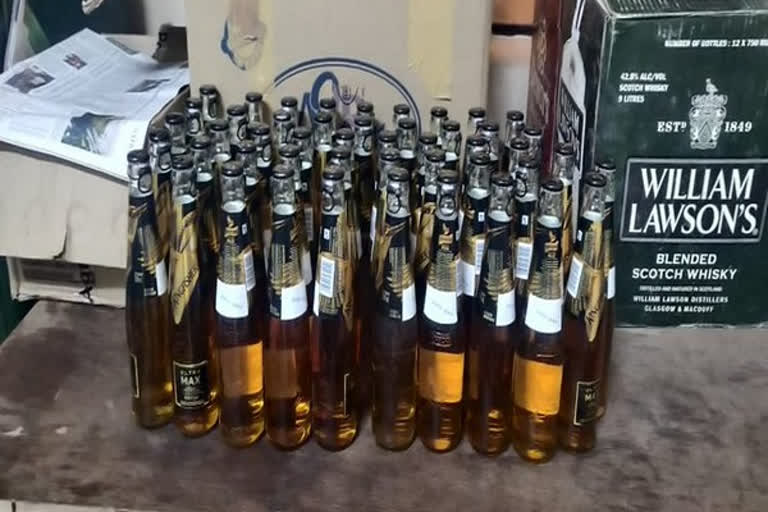 Two held with illicit liquor in Bengaluru  വ്യാജമദ്യം  നിര്‍മാണം  രണ്ട് പേര്‍ അറസ്റ്റില്‍  അറസ്റ്റില്‍  illicit liquor  Bengaluru