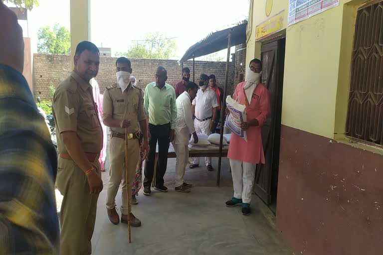 distributed packets of flour to poor peoples