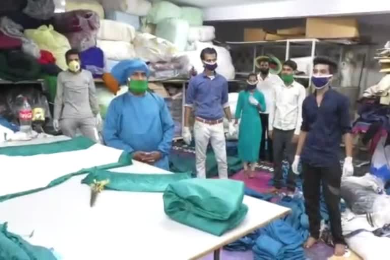 Garment cluster merchants of Jabalpur making personal protection kits for doctors