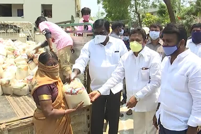 minister puvvada ajay kumar distributed daily essentials to the poor in khammam