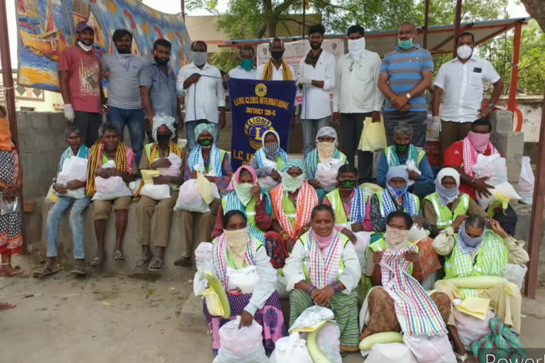 lions club of karimnagar members distributed daily essential to the poor in karimanagar