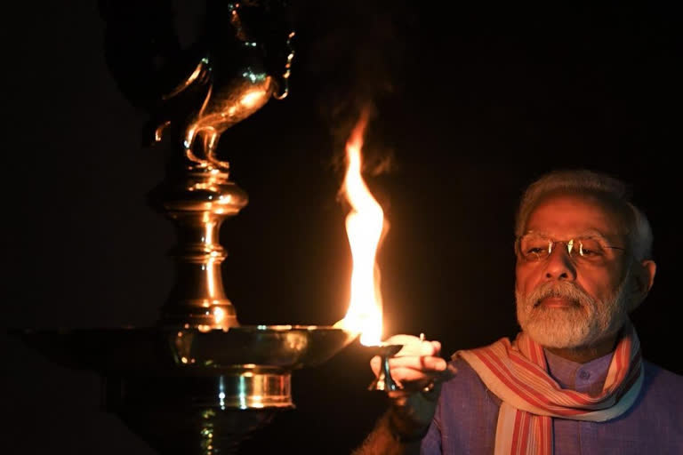 WATCH: PM Modi, ministers and CMs light diyas and candles in solidarity