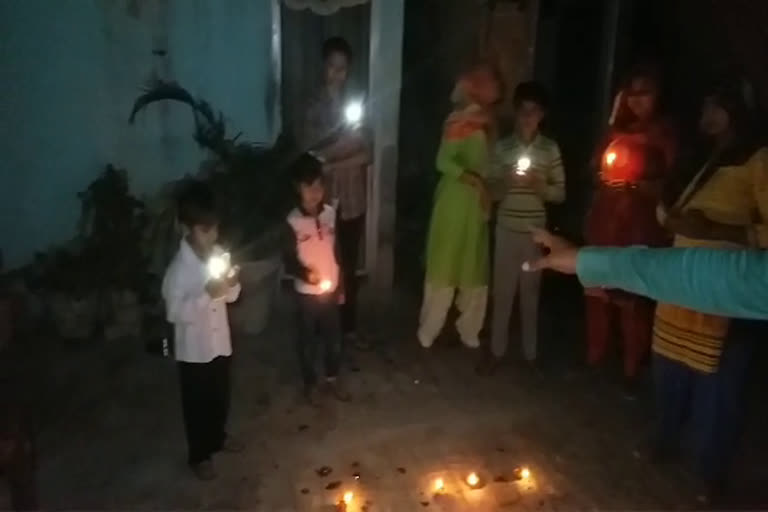 people lit lamps in panipat