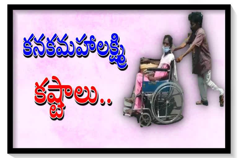 a women travels for dialysis on wheel chair at vishakapatnam