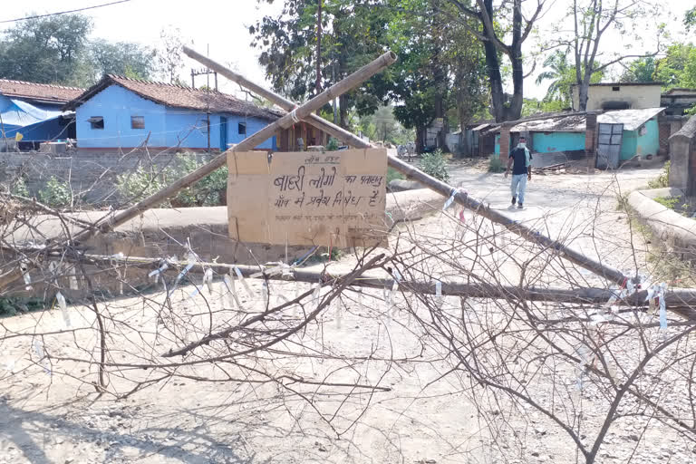 Villagers put up 'no entry' board at village entrance gate in chaibasa