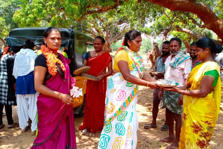 higras  distributes food to  poor people in visakha