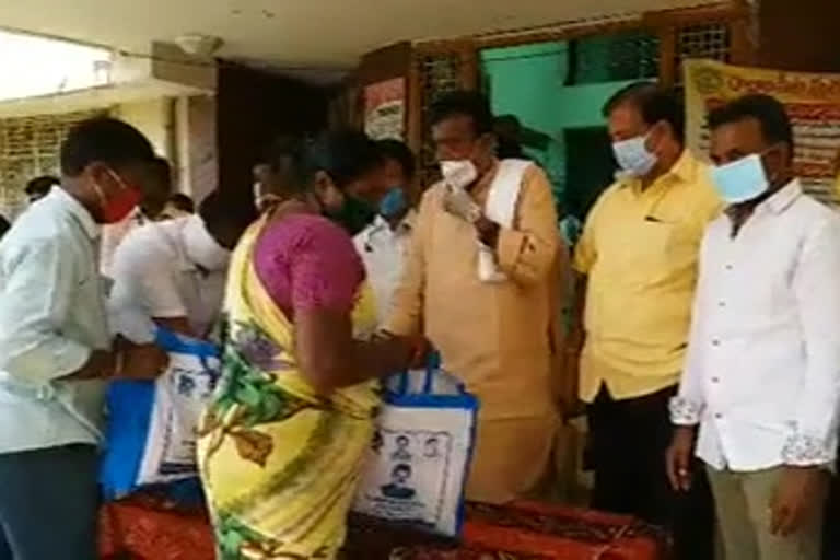 Essential commodities to sanitary labours at  rajampeta