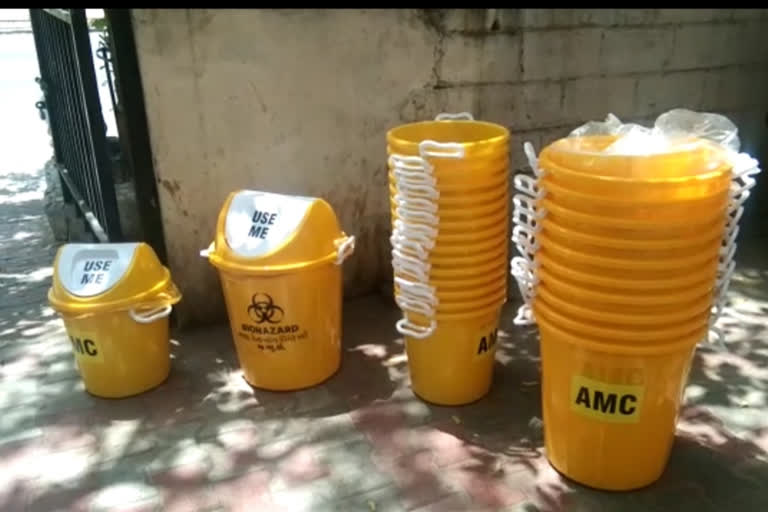 ellow dustbin made for throwing masks gloves in ahmadabad gujrat