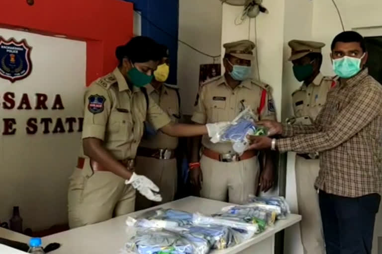 masks and sanitizers distributed to the police by the dcp rakshitha murty in medchal malkajgiri